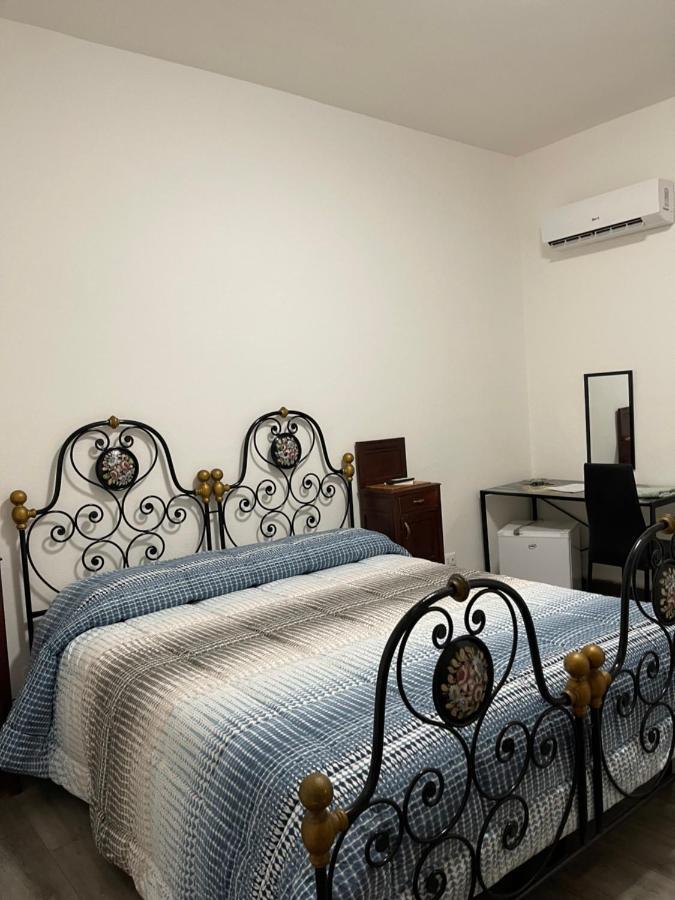 In The World Hotel Alghero Bagian luar foto